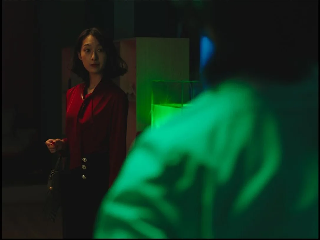 A deep composition charged with red and green light